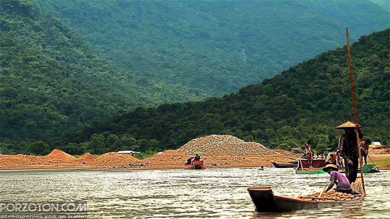 Jaflong Sylhet, workers collecting stones in Piyain river.